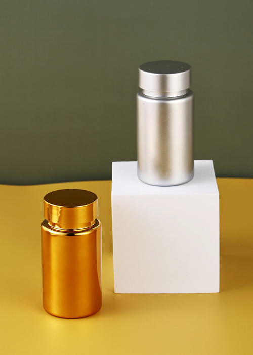 100-150g PET الكهربائي الذهبي الفضي اللون كبسولة زجاجة زجاجة منتجات الرعاية الصحية